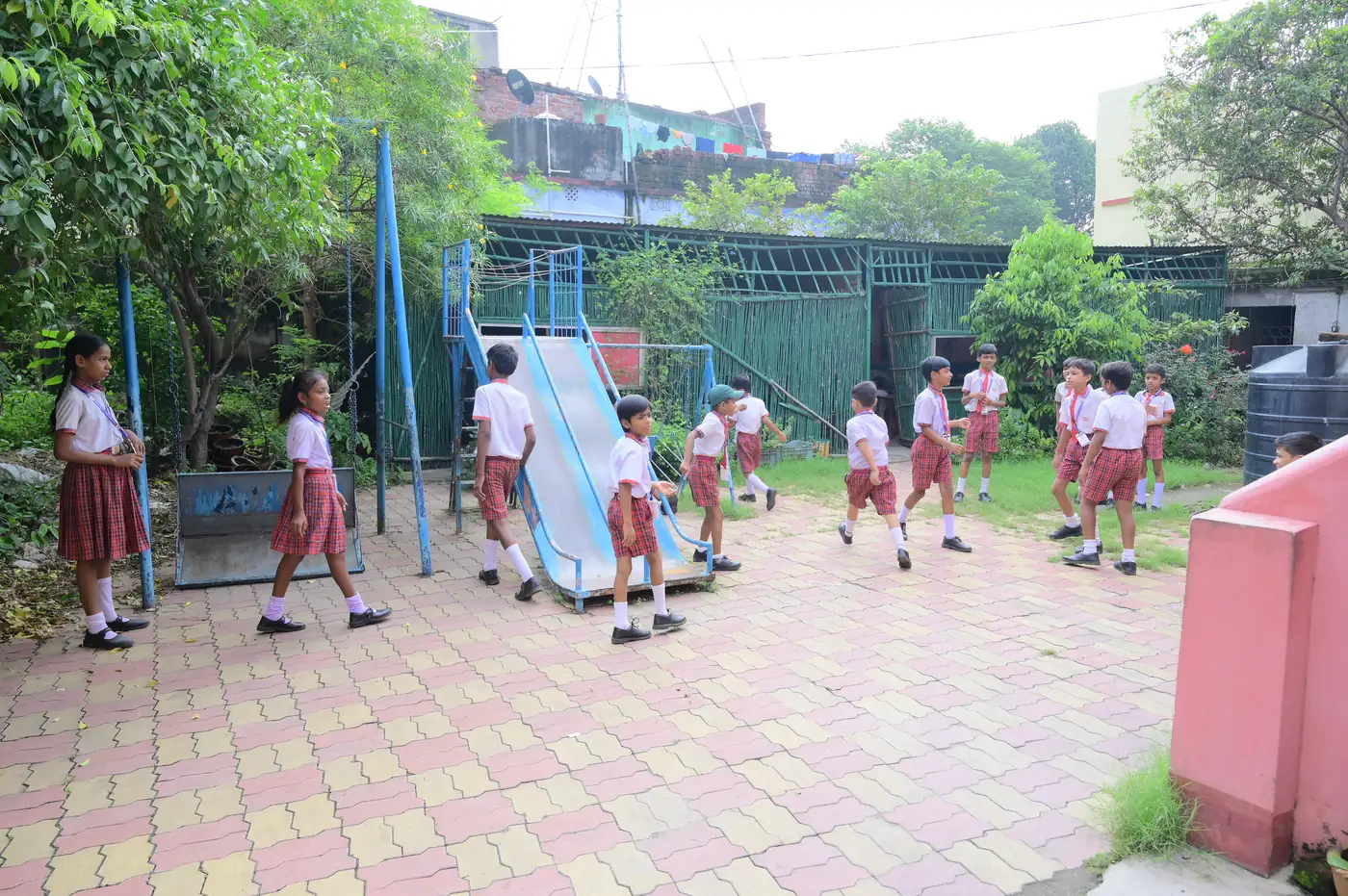 Children playing in the Kiddies Campus outdoor play area